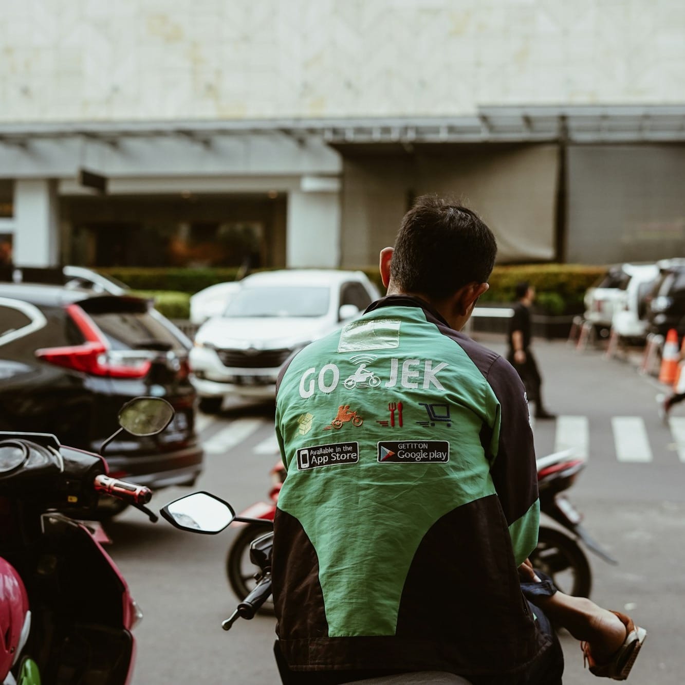 man sitting on motorcycle